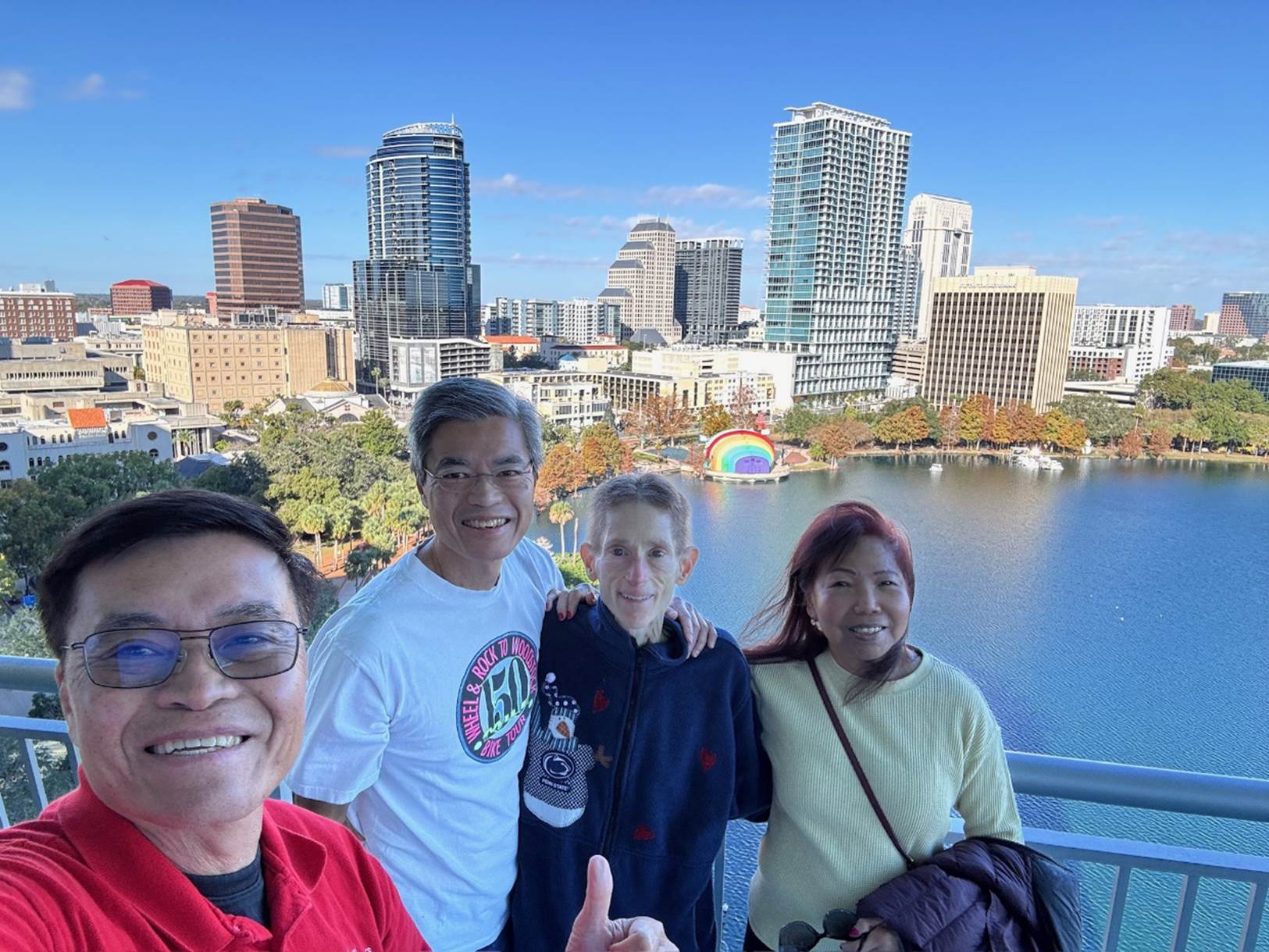 A group of people posing for a picture

Description automatically generated