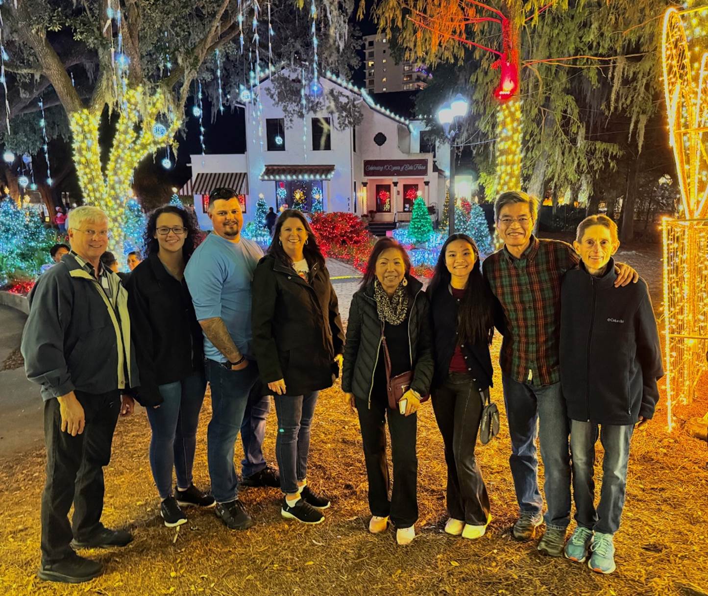 A group of people posing for a photo

Description automatically generated