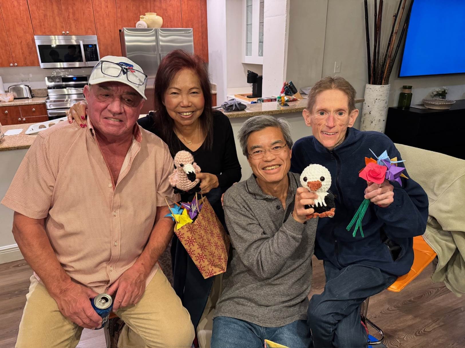 A group of people posing for a photo

Description automatically generated