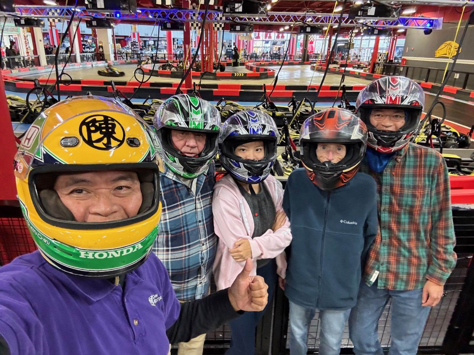 A group of people wearing helmets

Description automatically generated