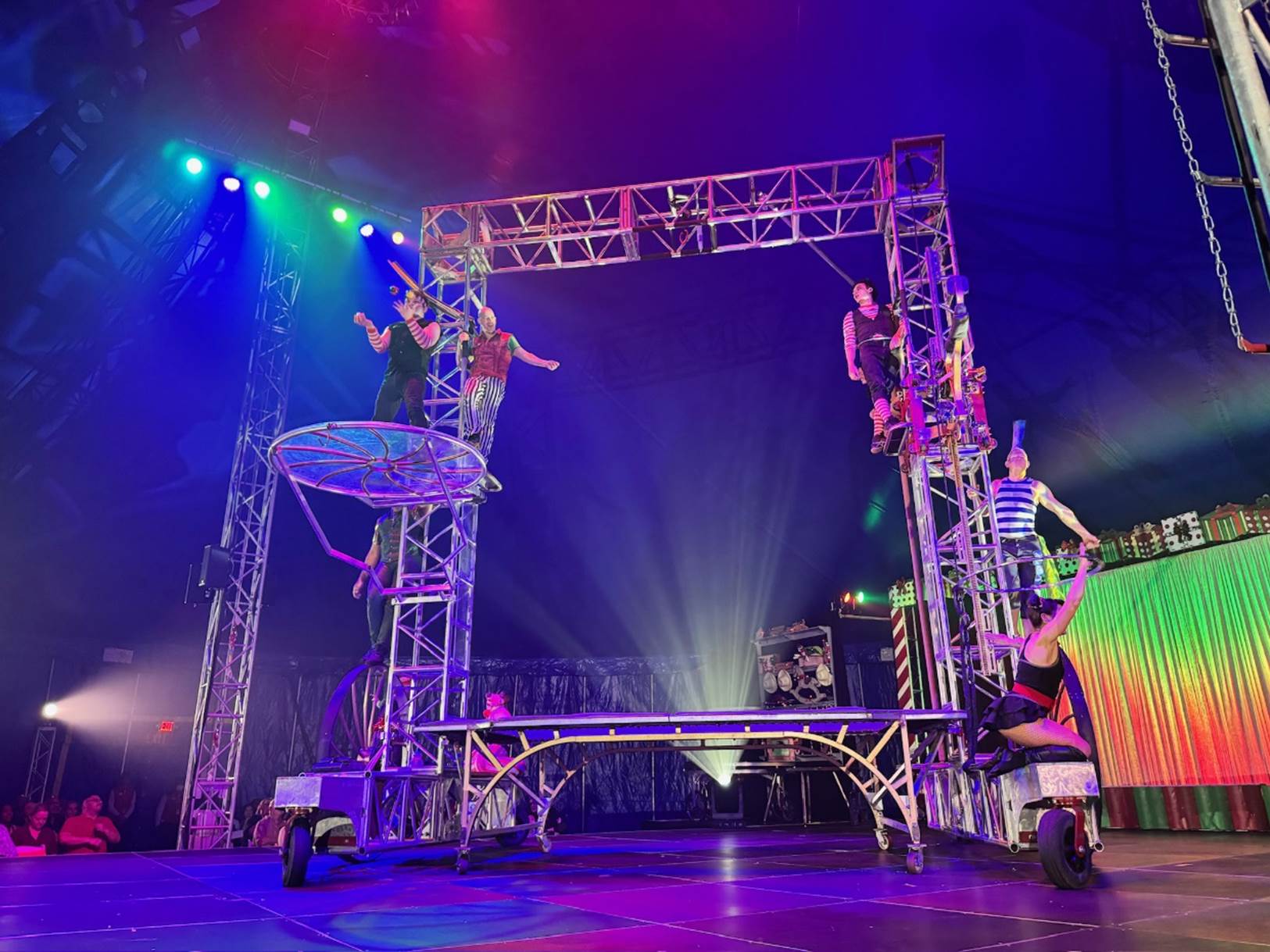 A group of people on a stage

Description automatically generated