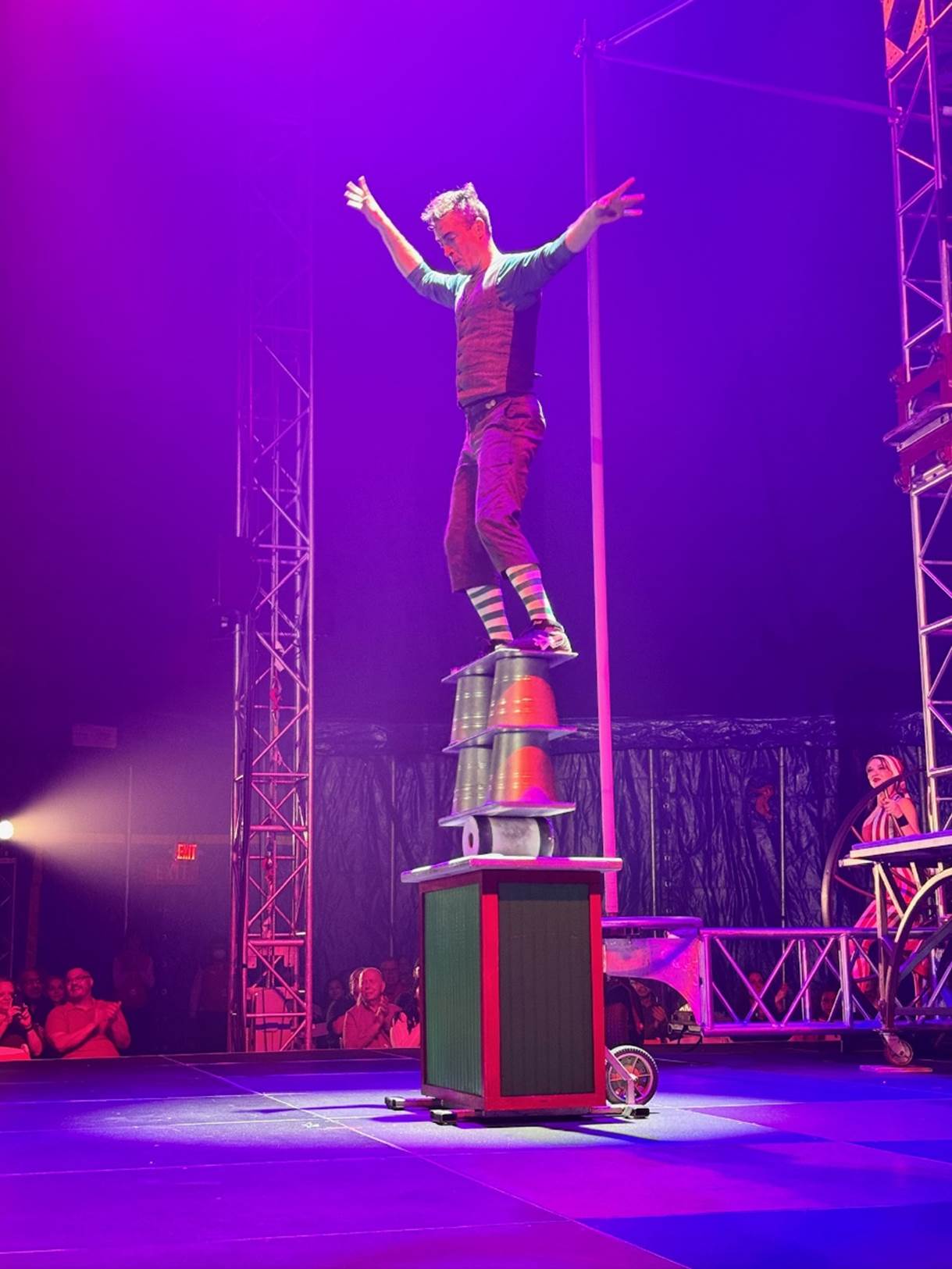 A person standing on a tower

Description automatically generated