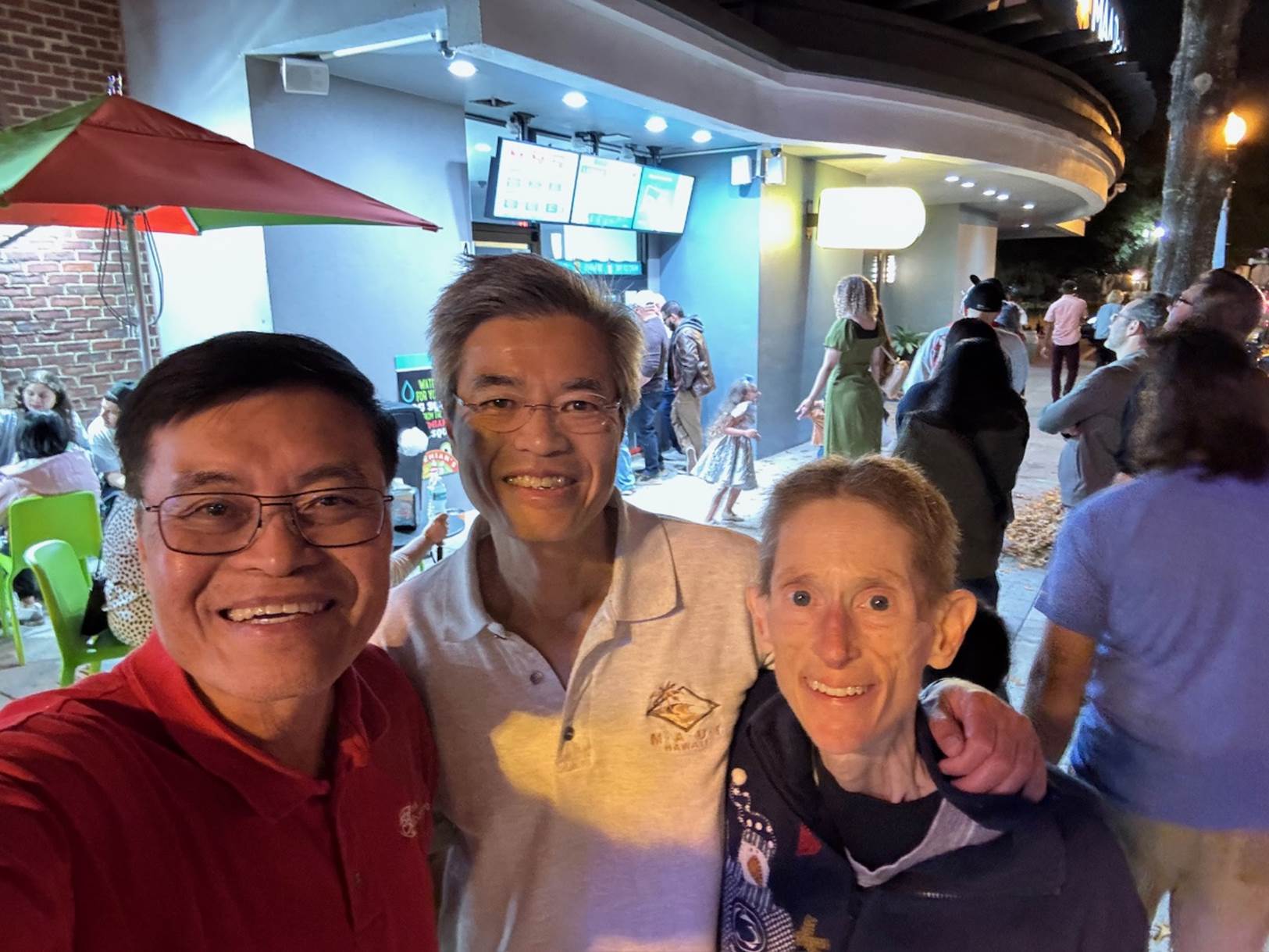 A group of people posing for a photo

Description automatically generated